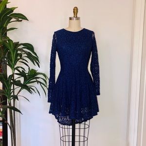 Flirty long sleeve laced hi-low mini dress